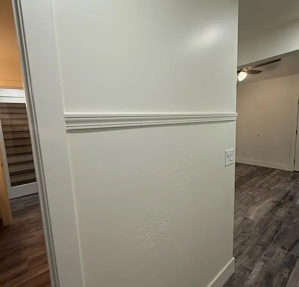 Entry hall has hand crafted stenciling of dandelions if you look close :) Adds to this east coast / craftsman-esque motif home