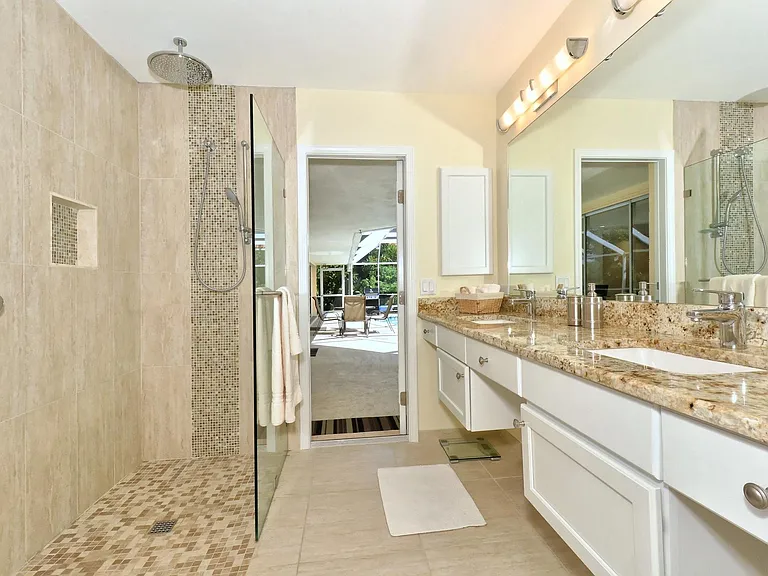 Master bath with rainshower, double vanities, granite counters