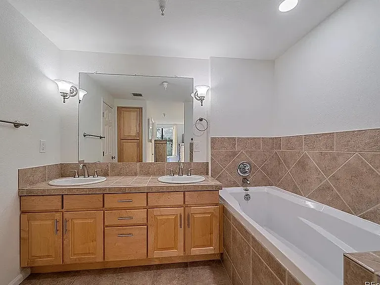 Main BR ensuite (also has shower & toilet in area separated by a door).