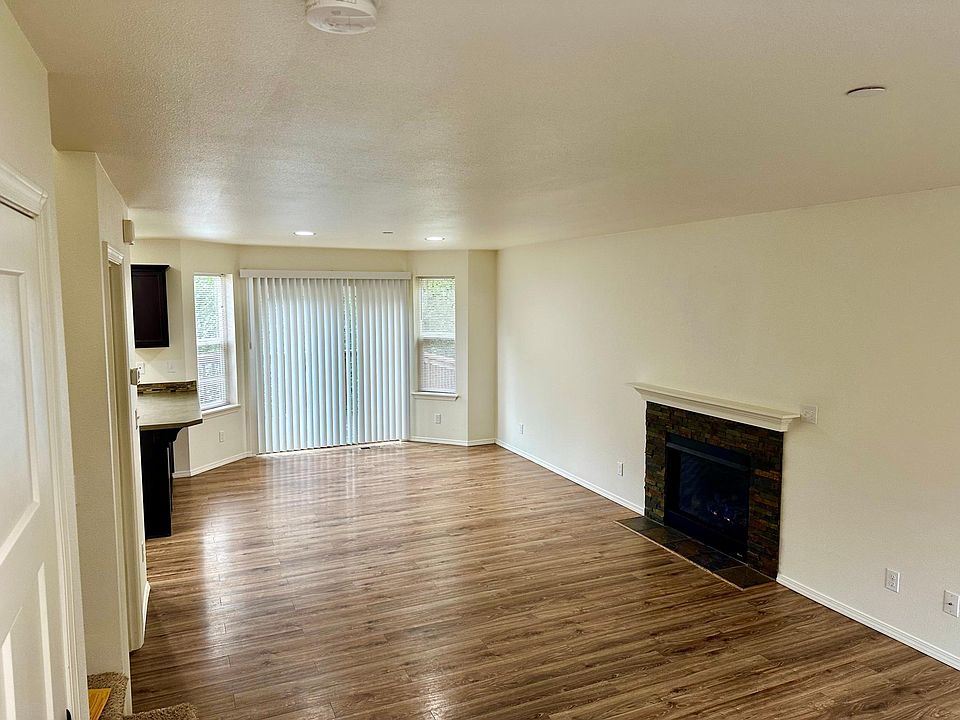 Cozy fireplace and spacious dining area. Make it your own
