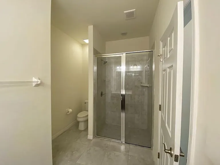 Master Shower and toilet.
