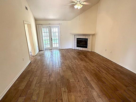Open floor plan and high ceilings in the main rooms
