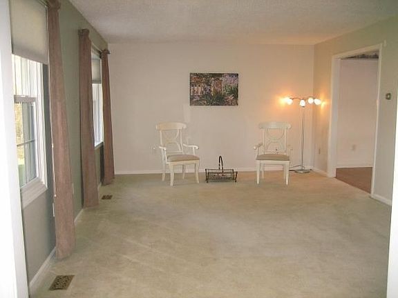 Large Living/Family room overlooks beautiful large green space