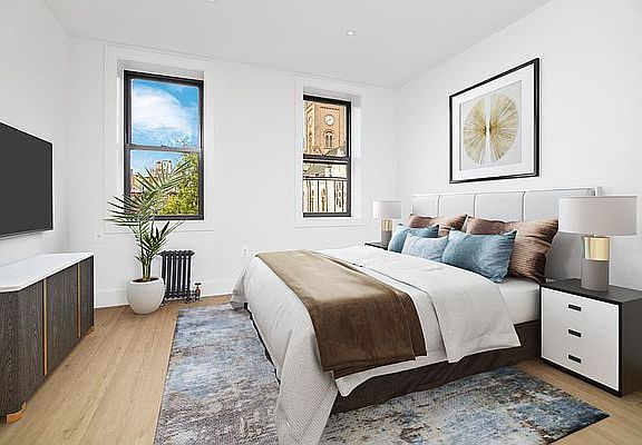 3rd image of 207 E 4th St APT 3C