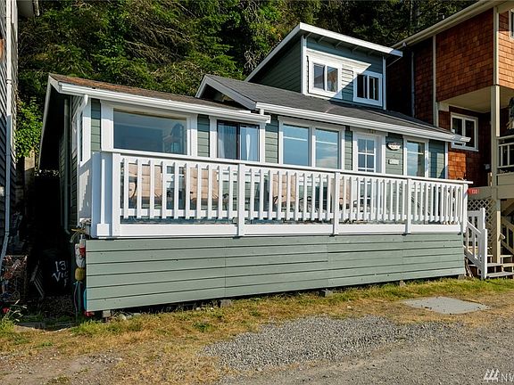 Two car parking in front.