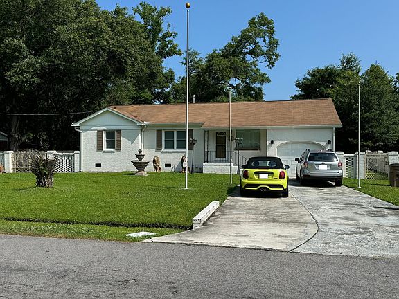 Front Exterior- Off Street Parking and One Car Garage