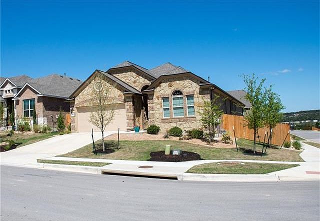 Home is on a premium corner lot.