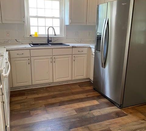 KItchen - New Sink, faucit, floor & stainless steel appliances