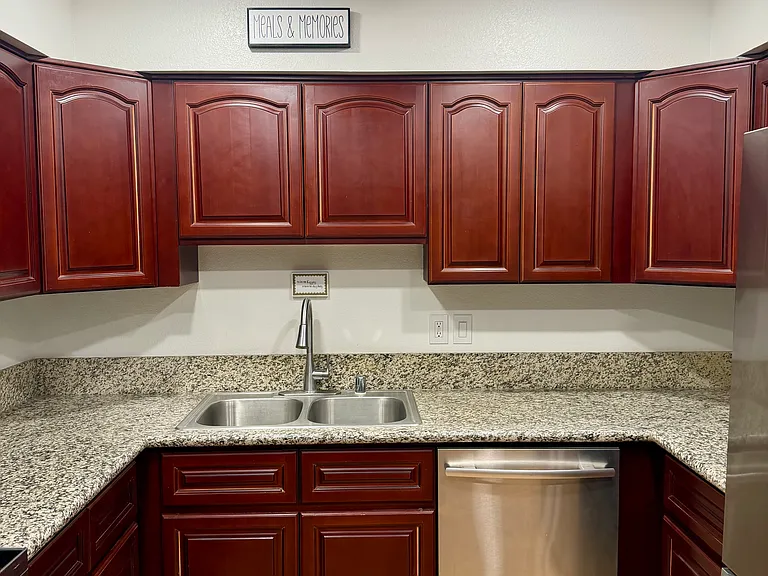Spacious kitchen with ample cabinetry and stainless steel appliances