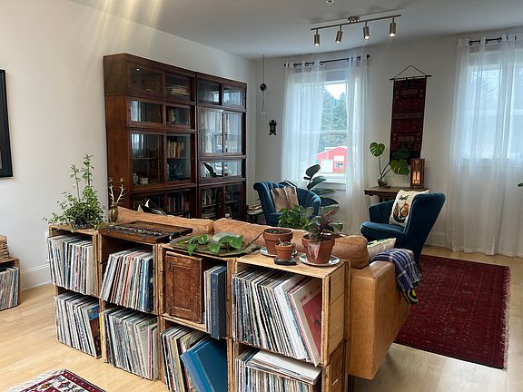 Open floor plan from kitchen into living room.