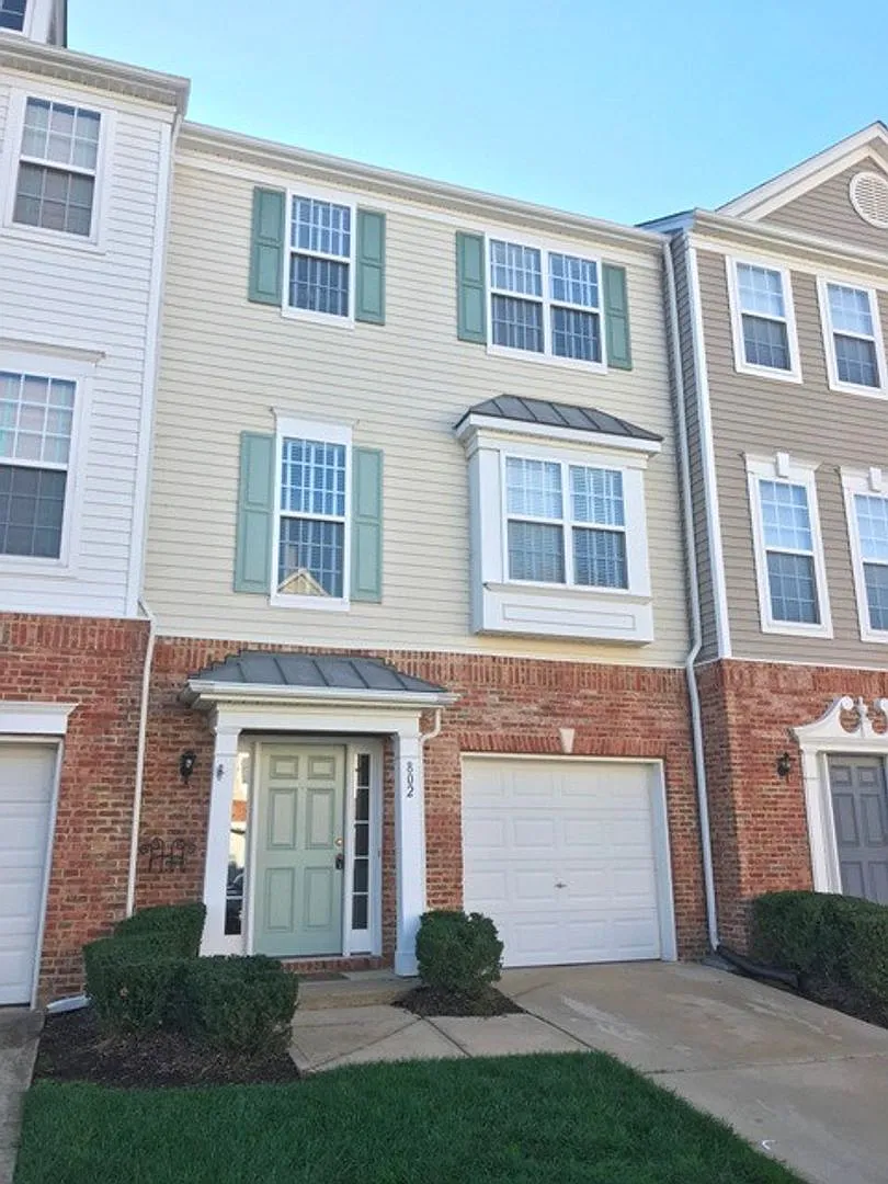 Freshly Updated Breckenridge Townhome with Pond Views & Flexible Living Space** — Photo 1