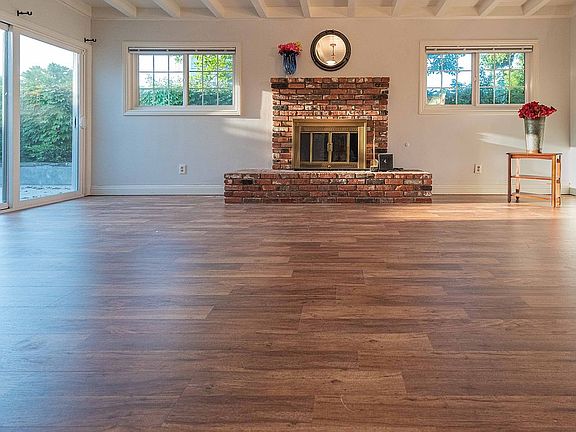 Family room with wood burnin