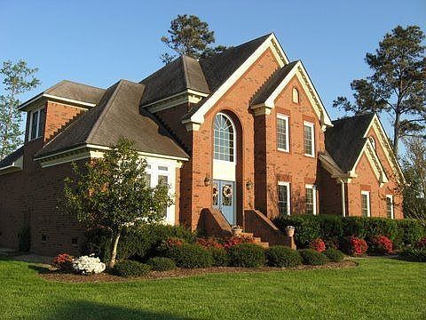 Extensive Brick Detail and Architectural Arches