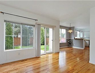 Open concept - walk out to fully fenced backyard.