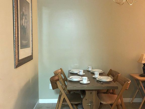 Cozy dining fit four more.