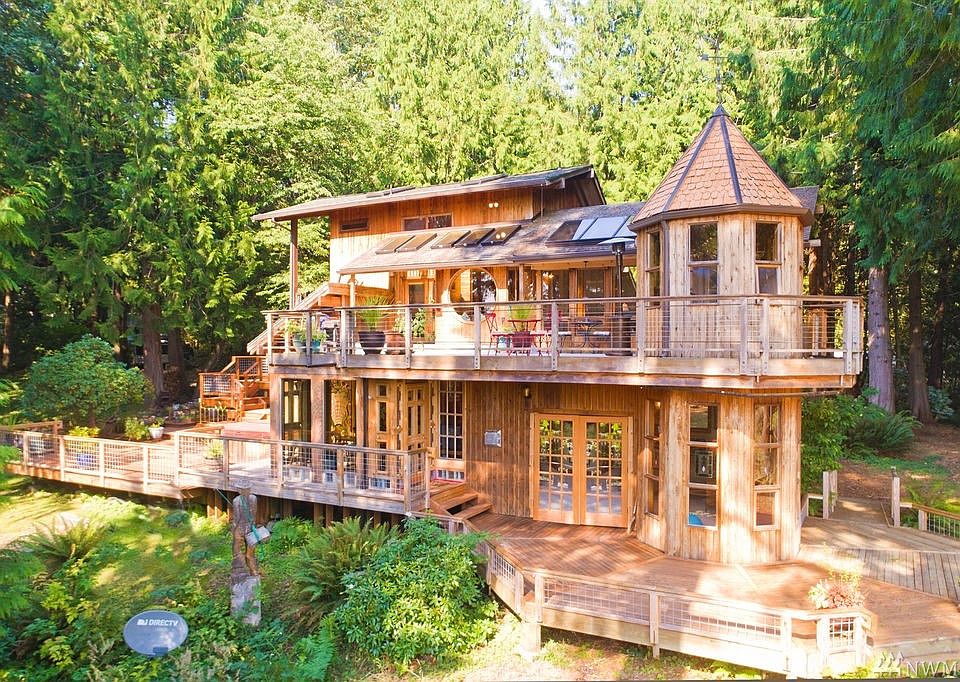 Your own grown up treehouse complete with magical turret, multiple balconies and all the whimsy you could ever dream of in a magical woodland setting. 