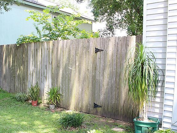8 Ft fence in front yard