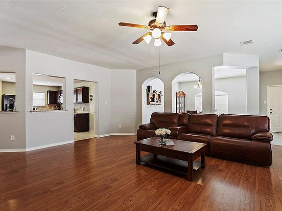 Open concept, but with defined spaces thanks to the architectural details.