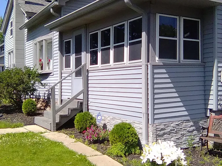 Side 3 SEASONS Porch off Kitchen.