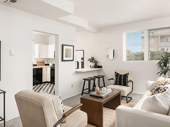 Look at those high ceilings! Furniture for show purposes only, unit is now vacant.