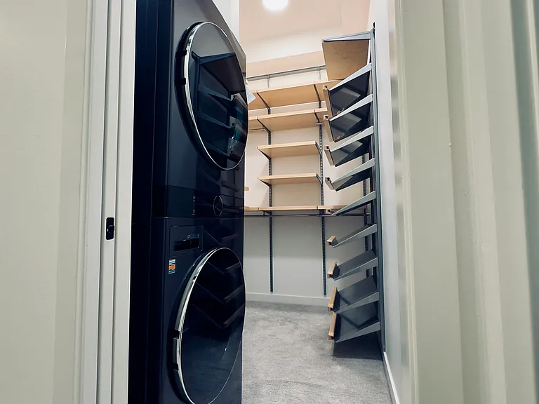 Master Bedroom Walk-in Closet with Smart Washer/Dryer Tower