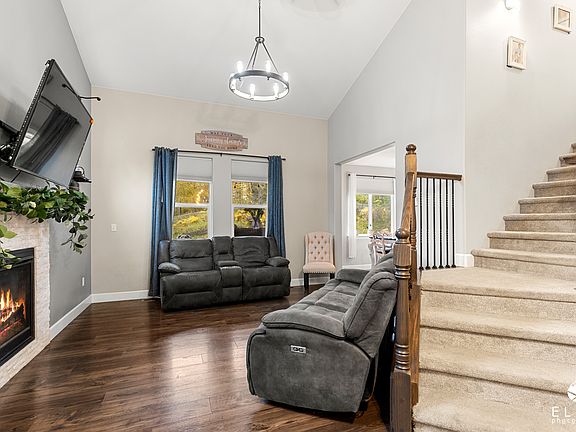 Living room with vaulted ceiling
