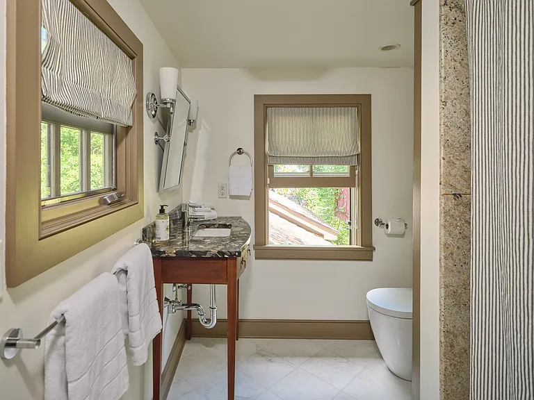 2nd Floor - Hall Bathroom with Shower and Tub - looking over back garden