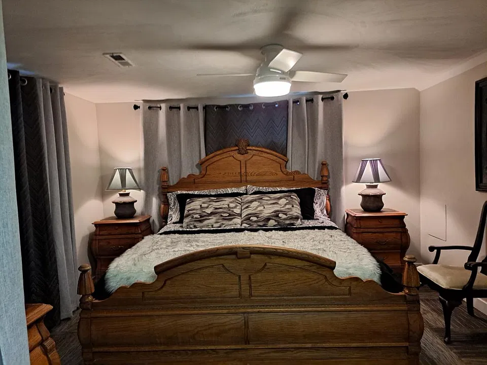 Main bedroom with king-size bed.