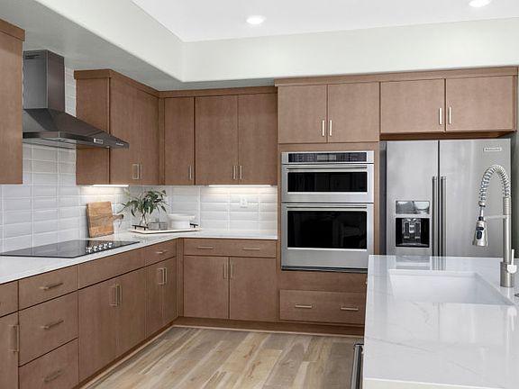 Kitchen with chef s appliance package