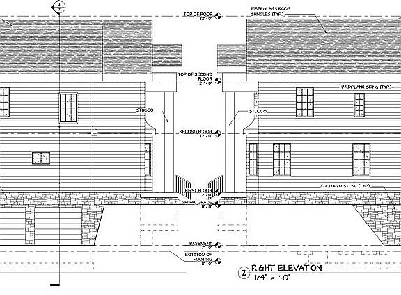 Sides with a 3 car garage