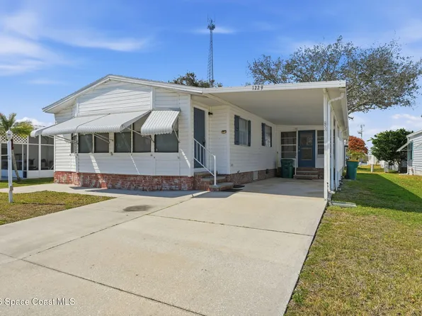 1229 Calusa Dr, Barefoot Bay, FL 32976