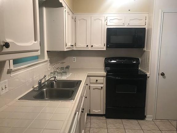 Kitchen has new appliances.