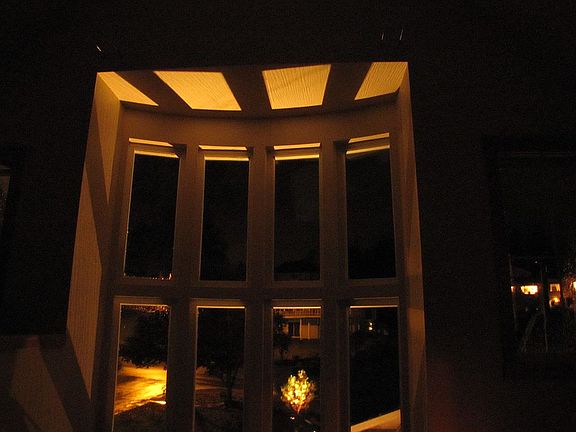 Tall bay windows at night