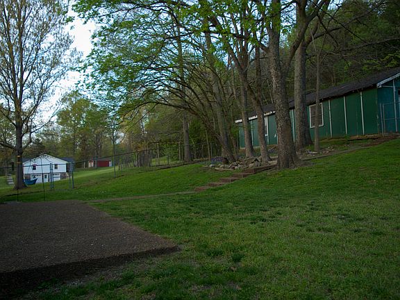 Shop/barn in back of home.
