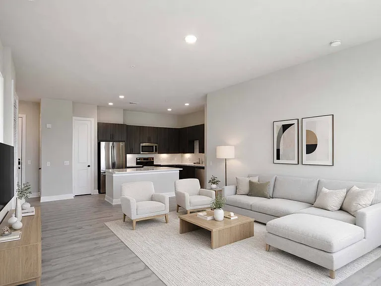 Enjoy the flow of open-concept living with a spacious kitchen and living room designed for comfort and connection.