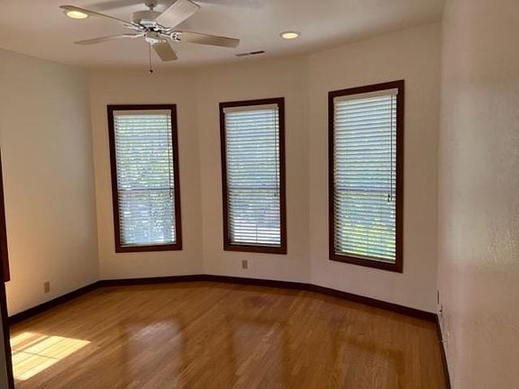 Living Room good natural light and hardwood floors