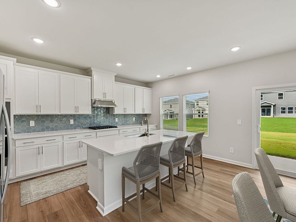 Kitchen in the Dakota floorplan at a Meritage Homes community in Garner, NC.