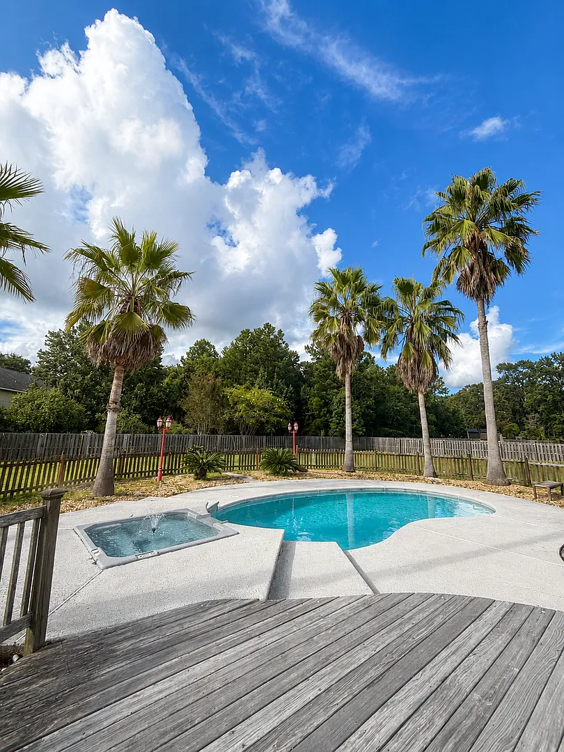 Spacious 4-Bedroom Home with In-Ground Pool! — Photo 2