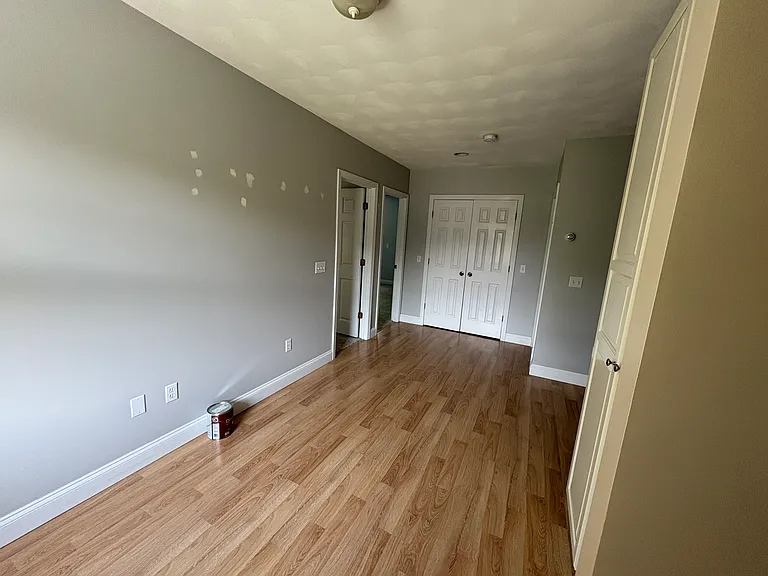Landing area outside bedrooms. It is currently being painted