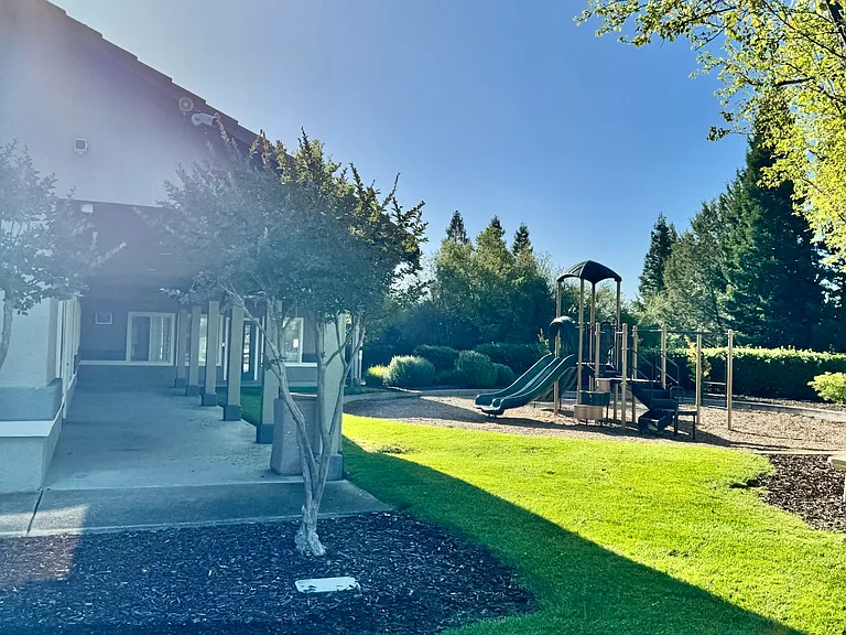 Club house/party room with adjacent playground