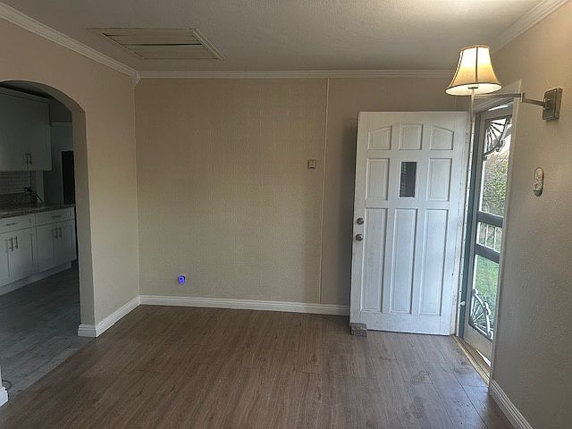 Other side of living room. Front door.