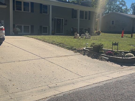 Front view from an angle with updated landscaping