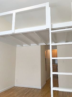 3rd image of 107 E 10th St APT 1B