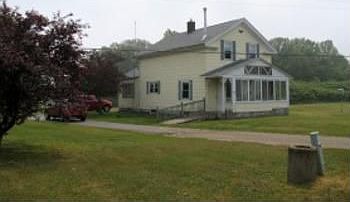 WOW, what a great buy! This updated farmhouse sits on a wonderful large 1.46 Acre yard on the lakesi