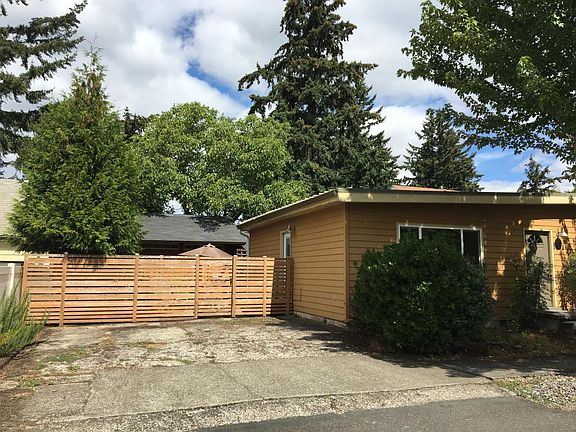 fenced in private side yard and driveway