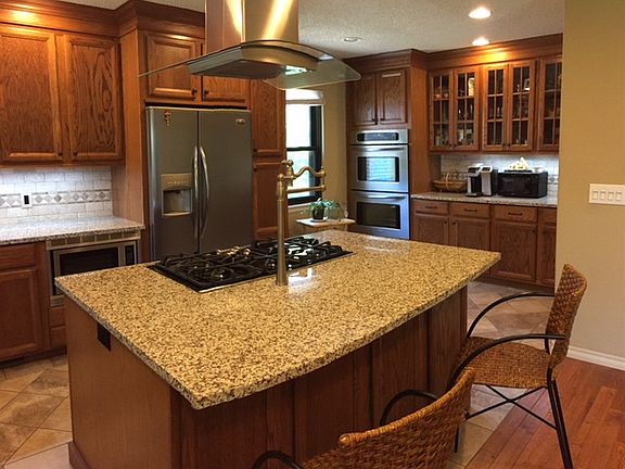 Chef's kitchen with every upgrade possible! 5-burner gas cooktop with pot-filler faucet.