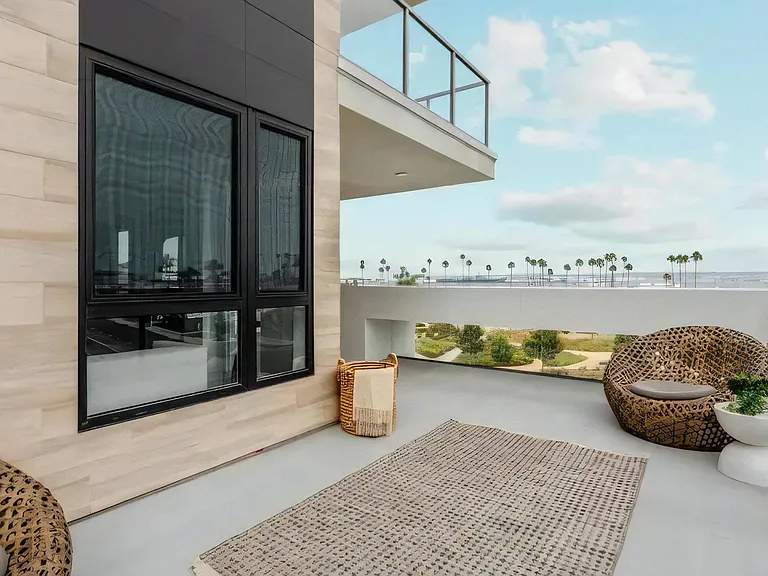 Peaceful Private Balcony with Ocean Views and Lounge Chairs