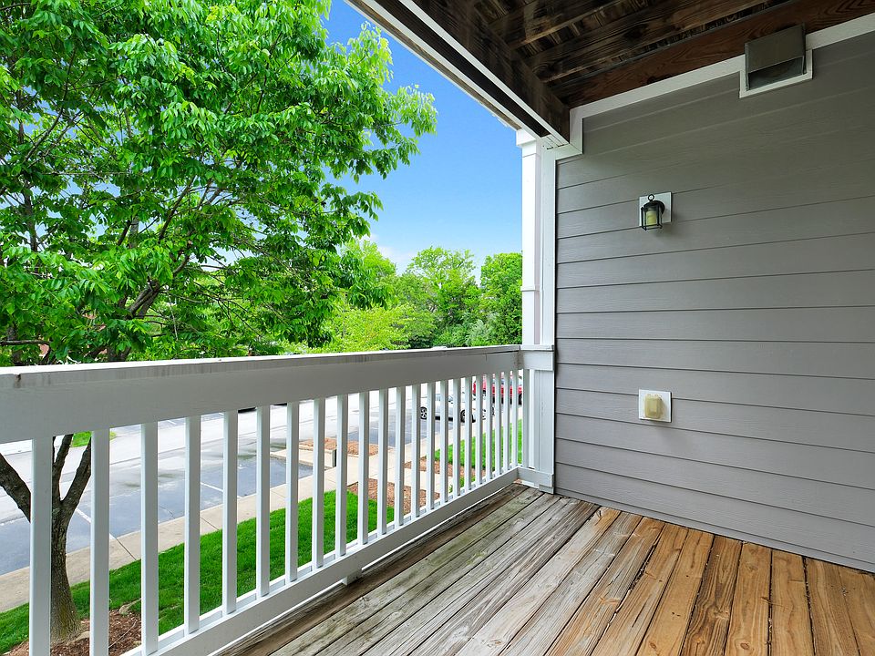 Private balcony leads off the living room area.