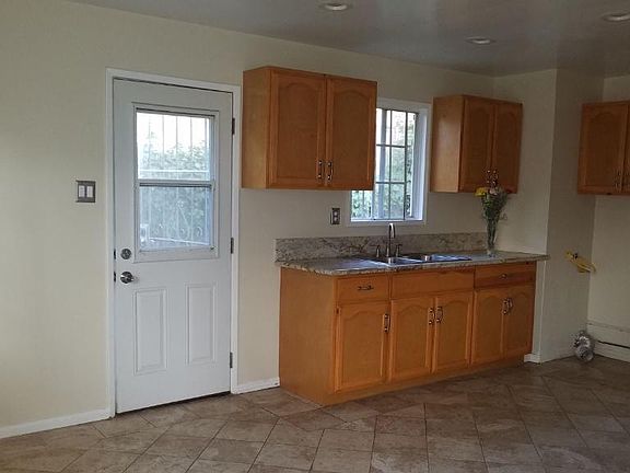 Beautiful Granite Countertops and Stainless Steel sink