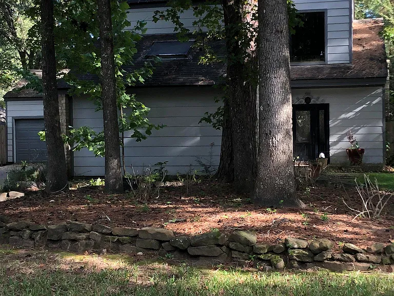 Exterior View from Front of House. Driveway on Left, Front D